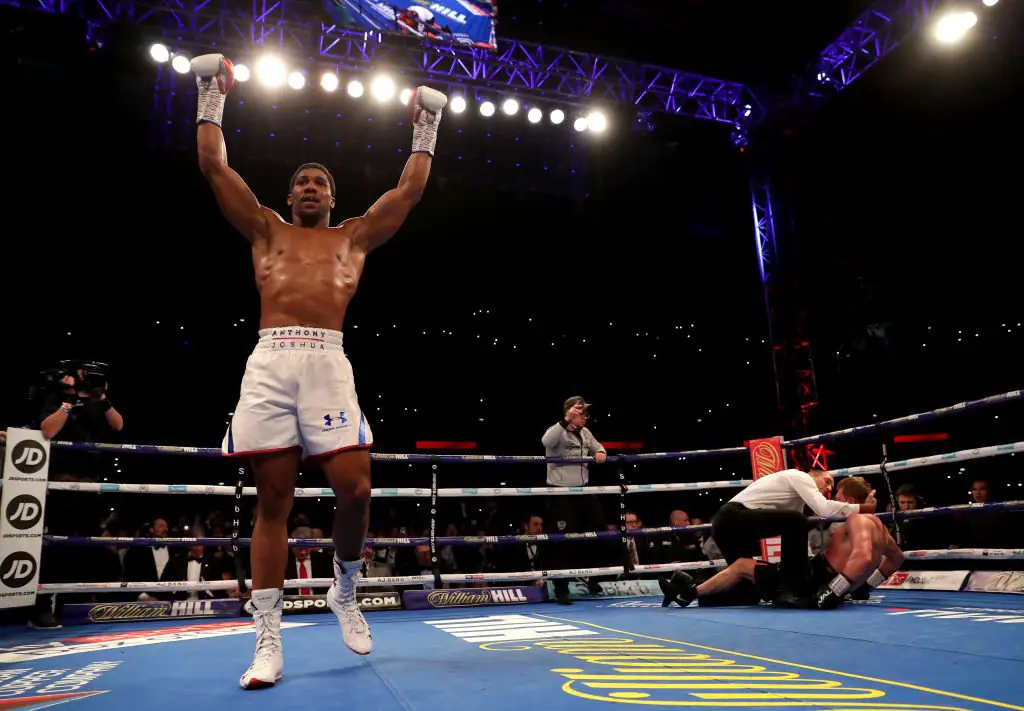 Joshua Knocks Povetkin Out To Defend World Titles