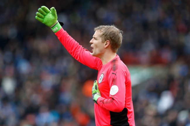 Lossl Leaving Huddersfield With Heavy Heart