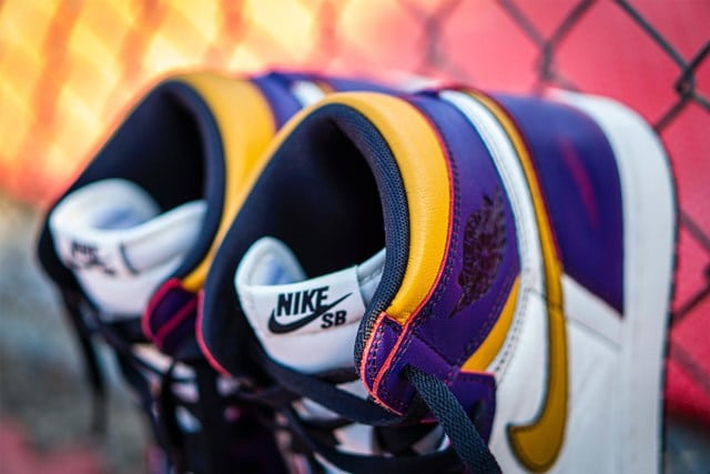 Closeup of purple, orange and white Nike sneakers