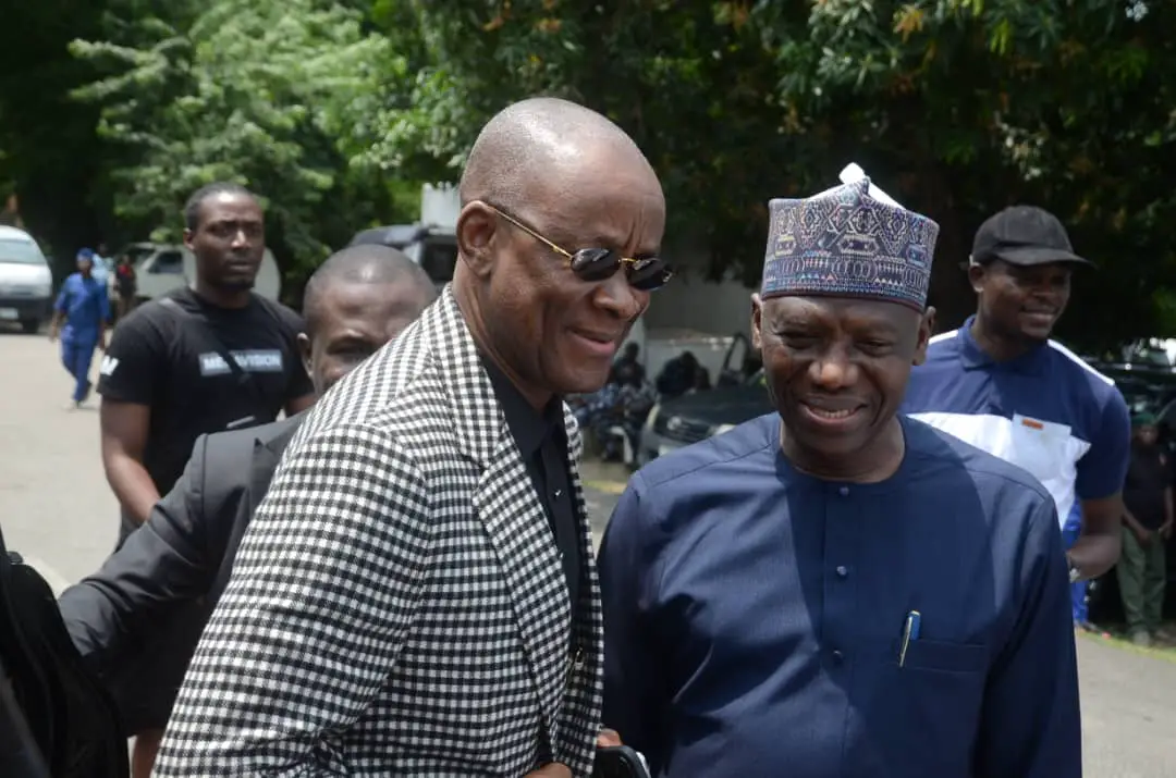Dr. Alao welcomes Senator Enoh on his arrival at the Tayo Aderinokun Lecture Theatre, University of Lagos 