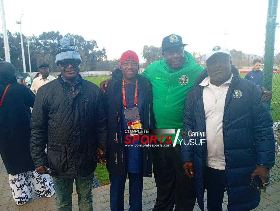 L-R: NFF Communications Director, Dr. Ademola Olajire; yours truly; ProSports News publisher Bayour Issa; and Kwara State FA boss at the Super Eagles final training ahead of the Ugandan game at AFCON 2025