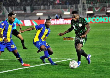 Super Eagles Off To A Flyer As Millions Of Fans Tune In To Watch AFCON 2025 Super Eagles' winger Moses Simon outwits Tanzanian opponents during their AFCON 2025 Group C Match in Fez