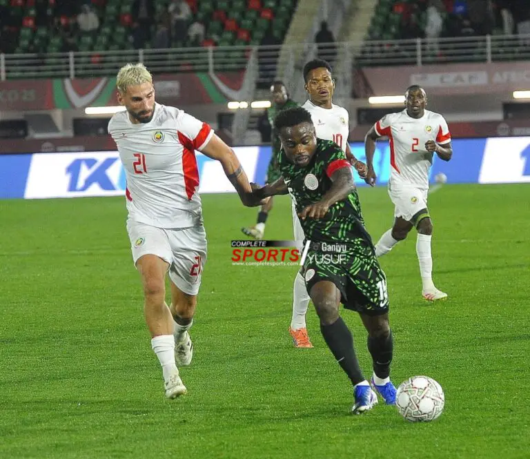 Super Eagles winger, Moses Simon, takes on Mozambique players at AFCON 2025