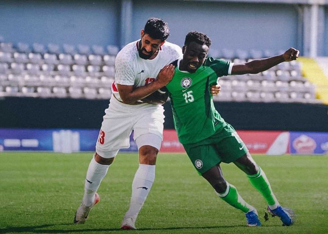 Super Eagles Win Vs Iran ‘Heart-Warming’ But No Consolation For World Cup Miss — Kalika Super Eagles winger Moses Simon tussles for possession with Iran's Hossein Kanaani