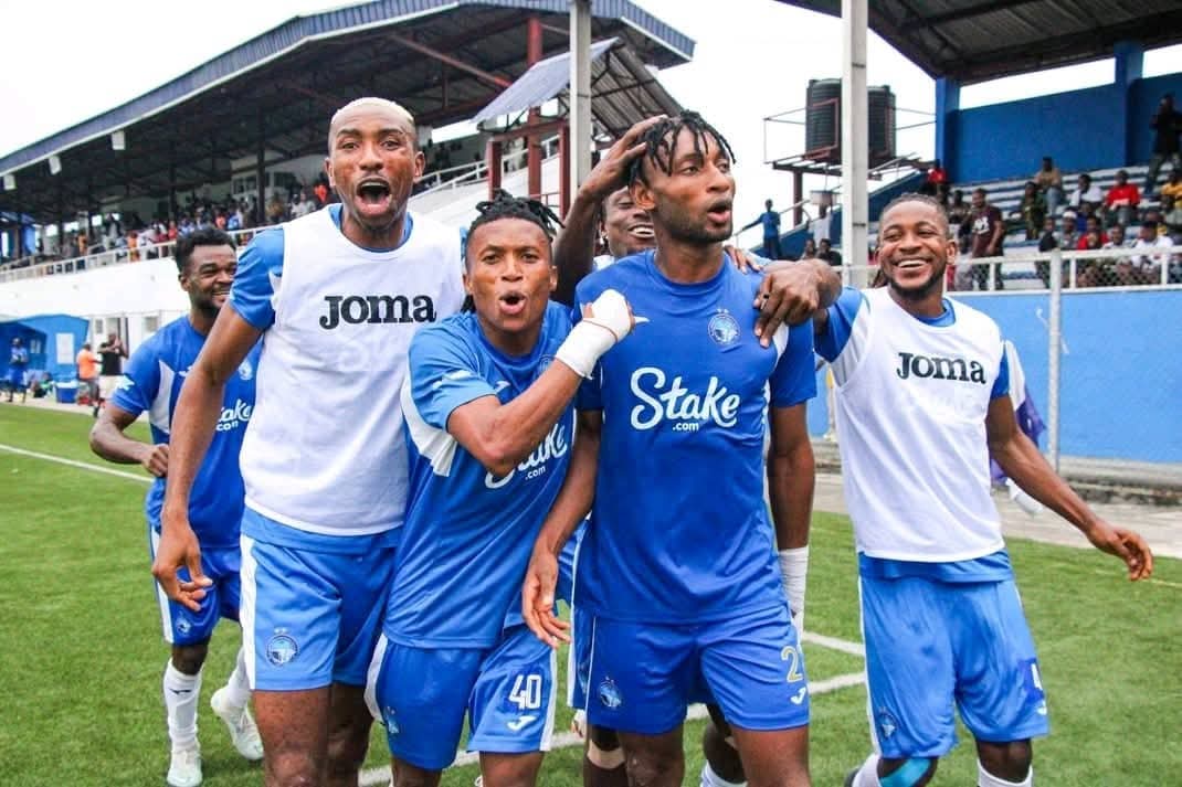 Chidera Michael (m) celebrates a goal with Enyimba teammates