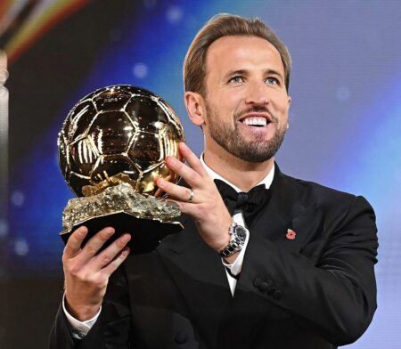 King Harry And The Ballon d’Or! — Odegbami Harry Kane celebrates after winning the 2026 Ballon d’Or award.